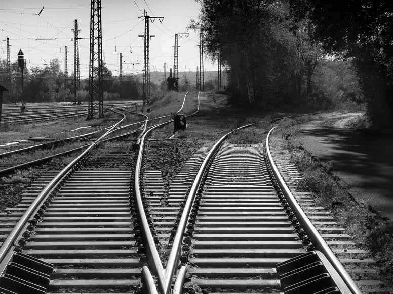 Diverging railroads. Photo by Michael on Pexels